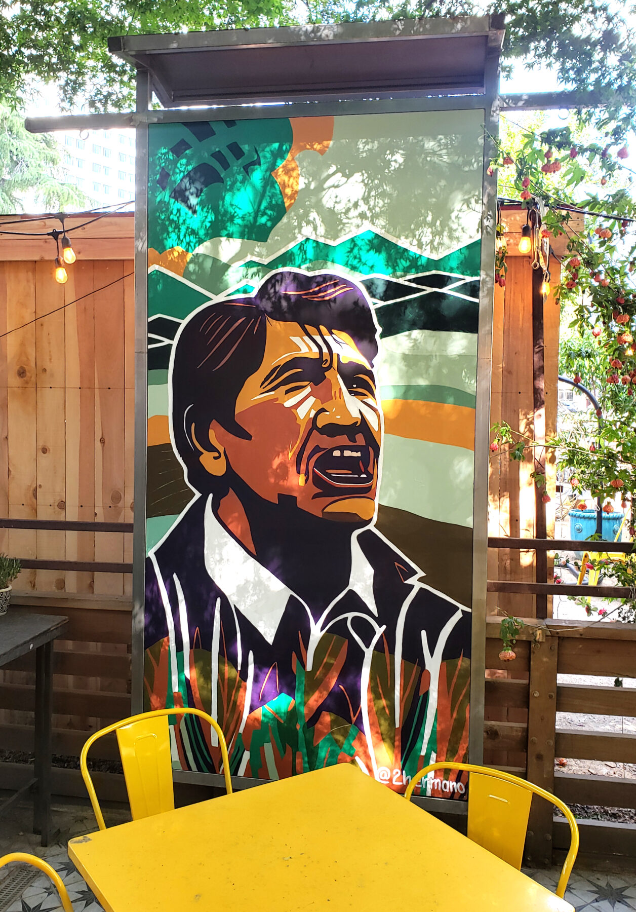 8fT foot Chicano Art murals with metal frames installed at La Cosecha restaurant Sacramento