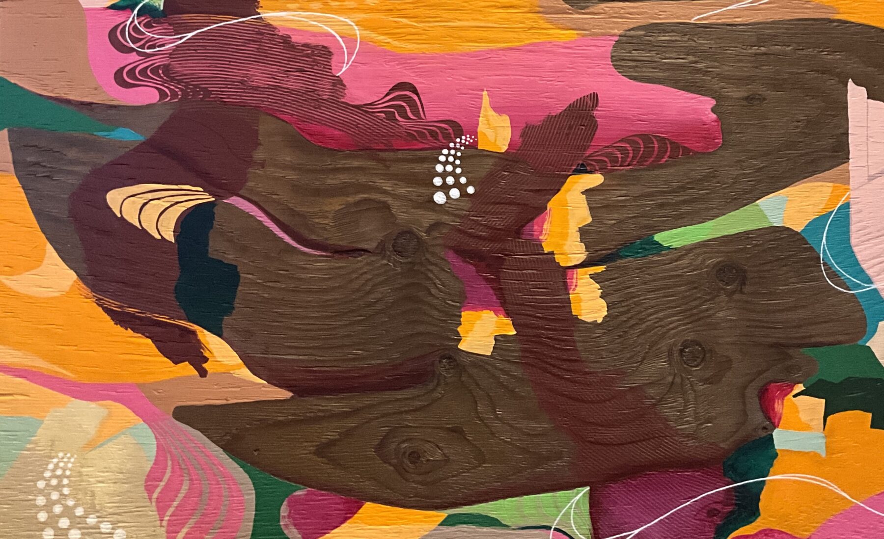 abstract painting on raw plywood showing hidden animal shapes in wood grain